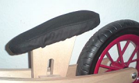 gepolsterte Sattelauflage für Holzlaufrad BambinoBike Laufrad, rot